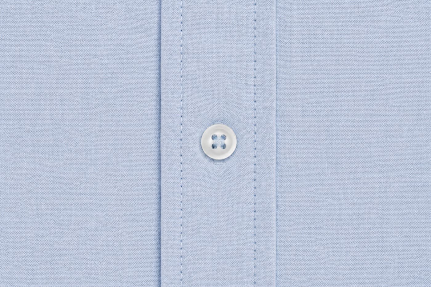 Macro photograph of a finished front placket with two parallel topstitch lines