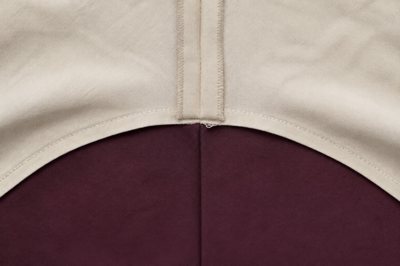 Macro photograph of a set-in sleeve head seam on a cotton shirt